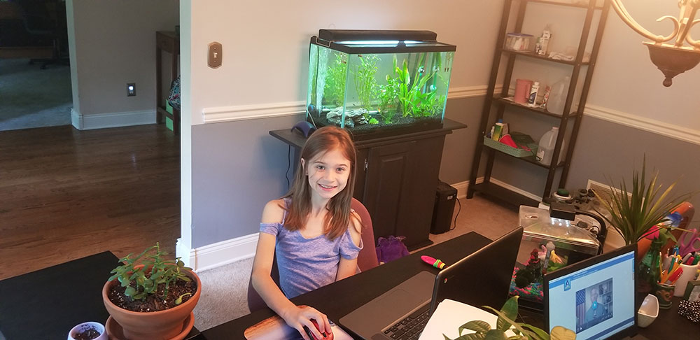 Leah at her desk